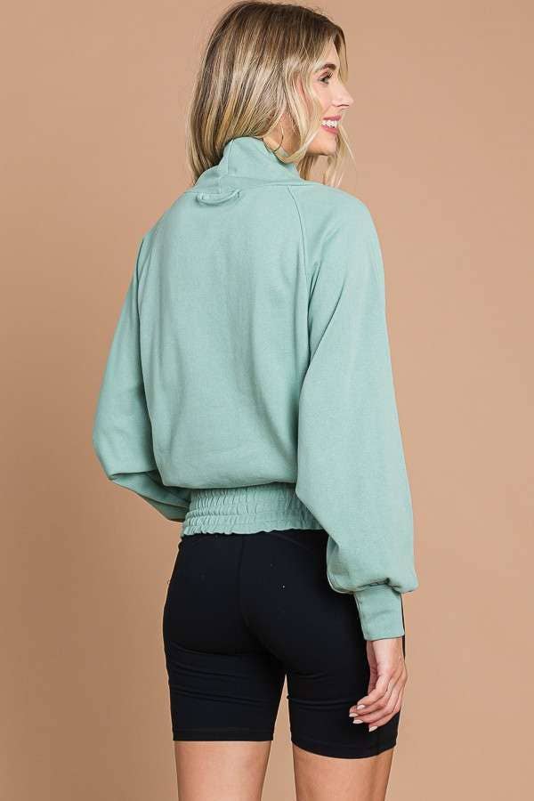 Culture Code Drape Neck Raglan Top in warm sage color, casual design with relaxed fit and raglan sleeves.