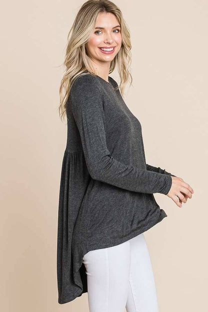 Black crew neck tunic top with shirring back from Culture Code, styled as a casual shirt or blouse.