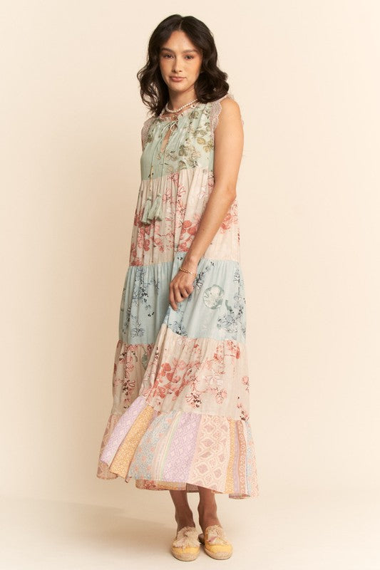 Plus size floral tiered block print sleeveless maxi dress by Davi&Dani, featuring vibrant patterns and flowing fabric.