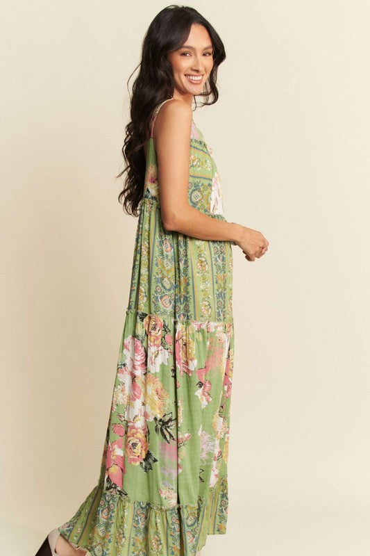 Gorgeous mixed print boho maxi dress by Davi & Dani, featuring flowing fabric and vibrant patterns suitable for casual or beach wear.