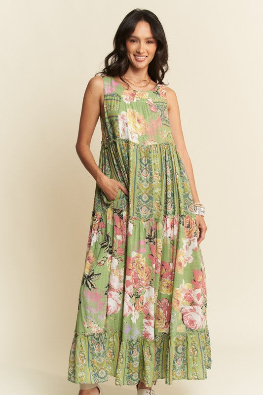 Gorgeous mixed print boho maxi dress by Davi & Dani with flowing fabric and vibrant patterns, perfect for casual or summer wear.