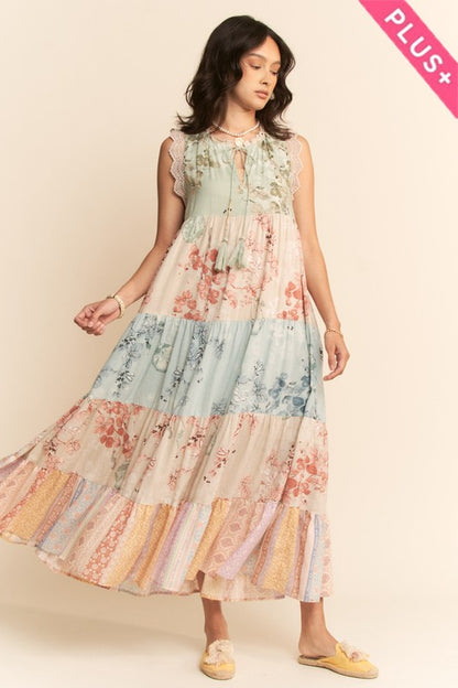 Plus floral tiered sleeveless maxi dress by Davi&Dani featuring vibrant block print and flowing silhouette.