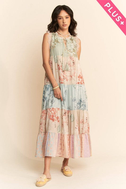 Plus floral tiered sleeveless maxi dress by Davi&Dani featuring vibrant block print and flowing silhouette.