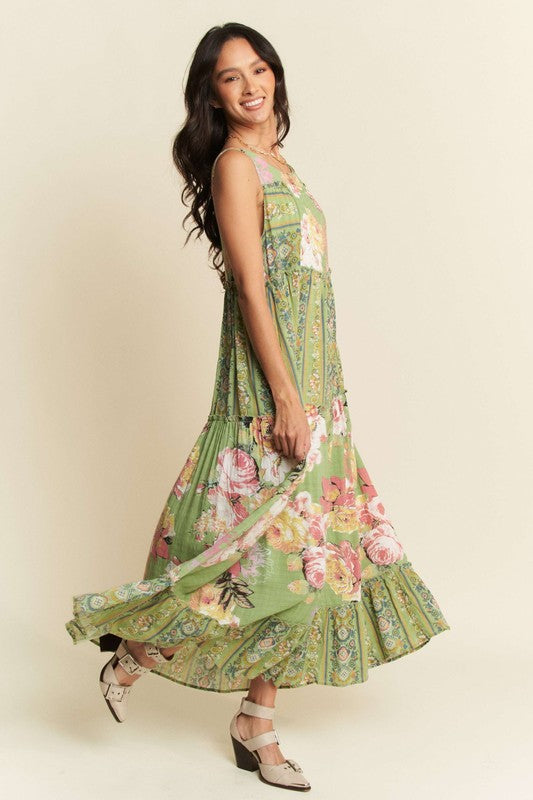 Gorgeous mixed print boho maxi dress by Davi & Dani featuring flowing fabric and stylish bohemian design.