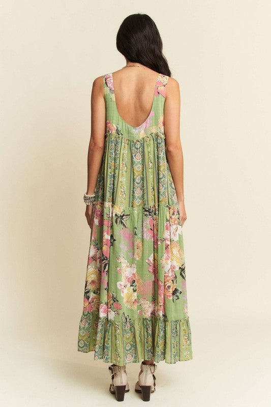 Gorgeous mixed print boho maxi dress by Davi & Dani featuring flowing fabric and vibrant patterns, perfect for casual or beach wear.