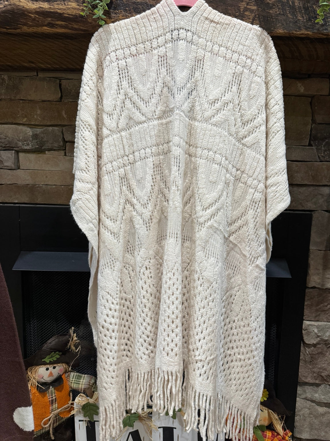 Ivory knit poncho back view
