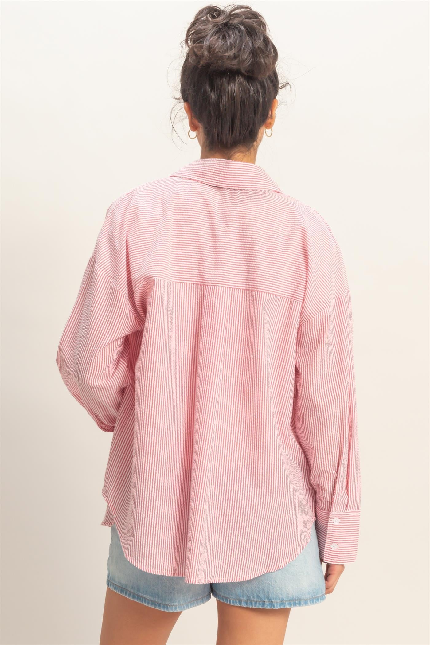 Long sleeve striped button-down shirt in assorted colors from Double Zero, featuring black and white vertical stripes.
