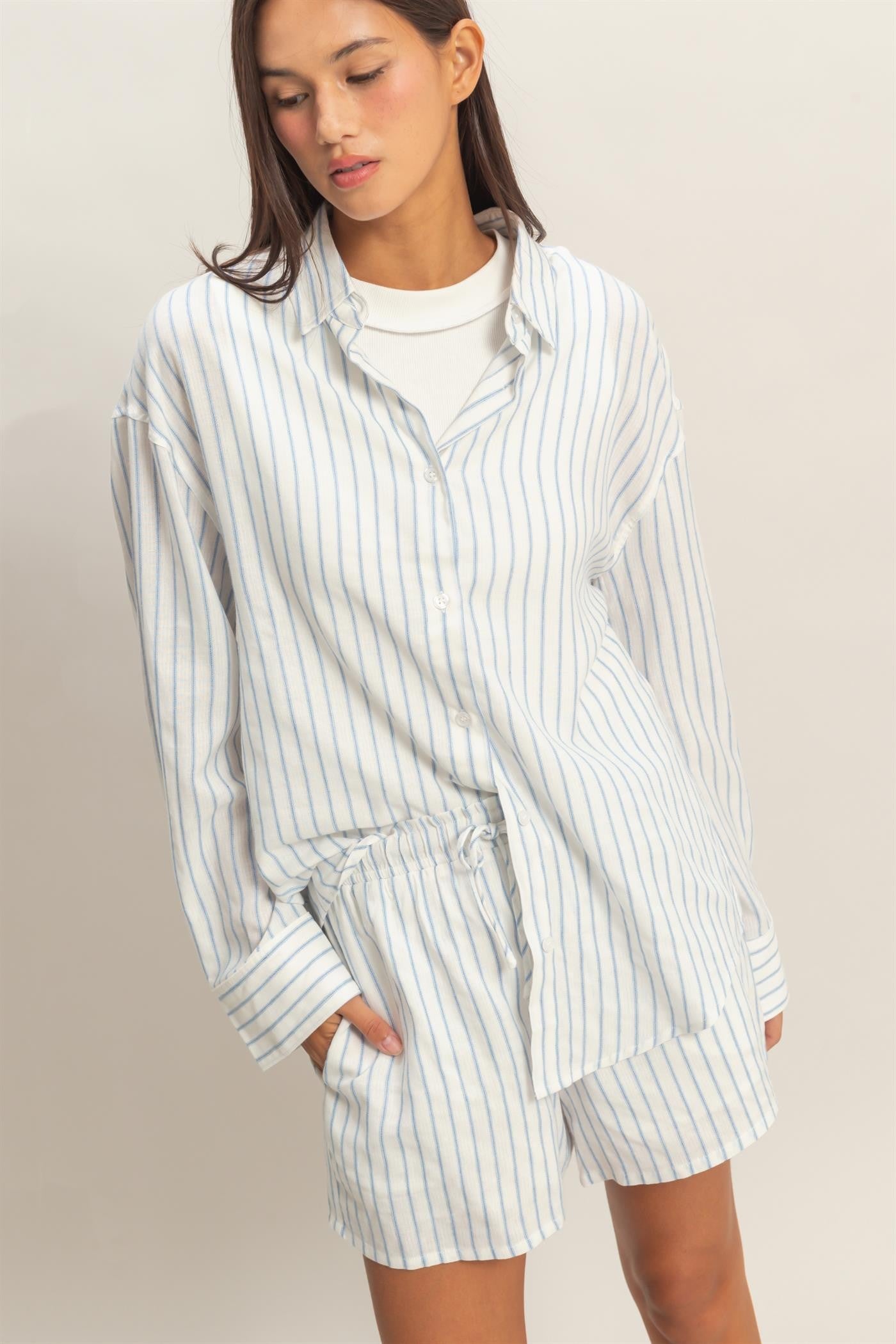 Lightweight blue striped button-down long sleeve shirt by Double Zero, casual and stylish for everyday wear.