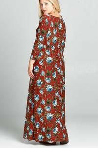 Emerald plus size 3/4 sleeve floral maxi dress, flowing fabric with a vibrant floral pattern, perfect for warm weather.