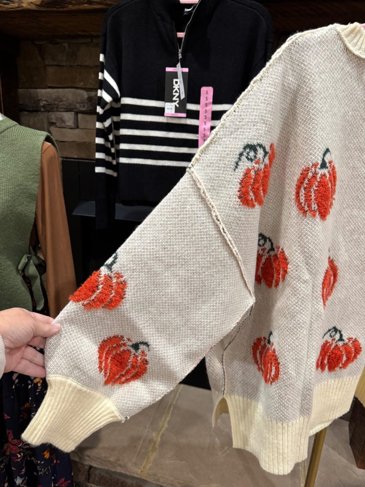 Fantastic Fawn ivory pumpkin oversized sweater sleeve detail