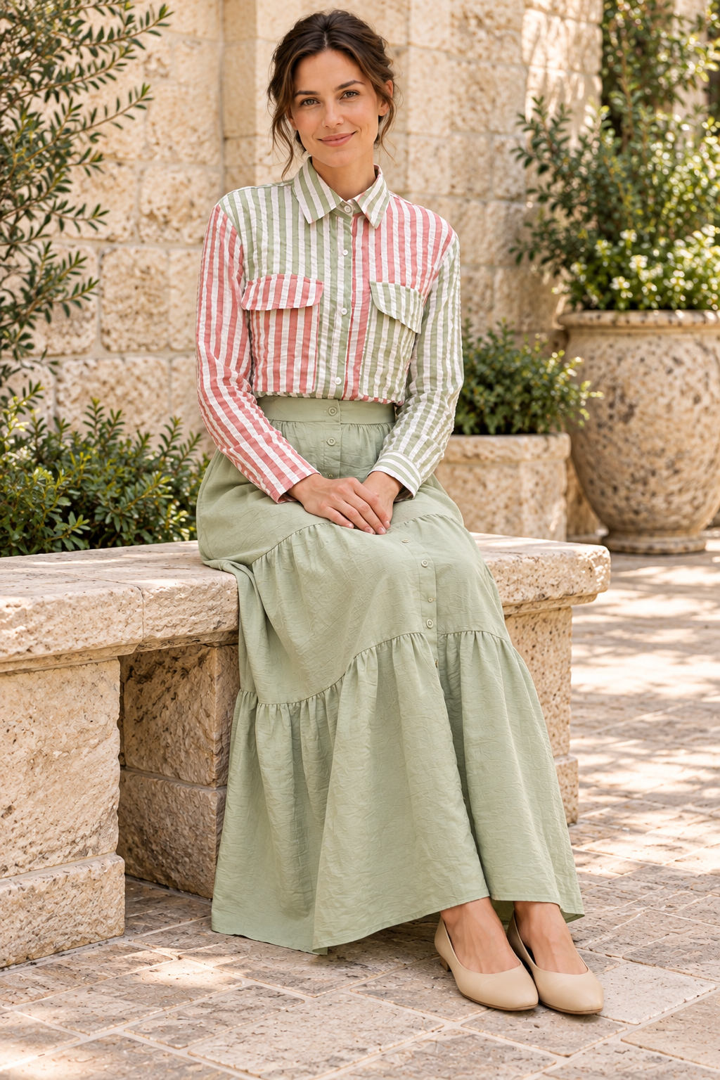 Fantastic Fawn striped long-sleeve shirt paired with Timing sage green tiered maxi skirt, seated lifestyle view