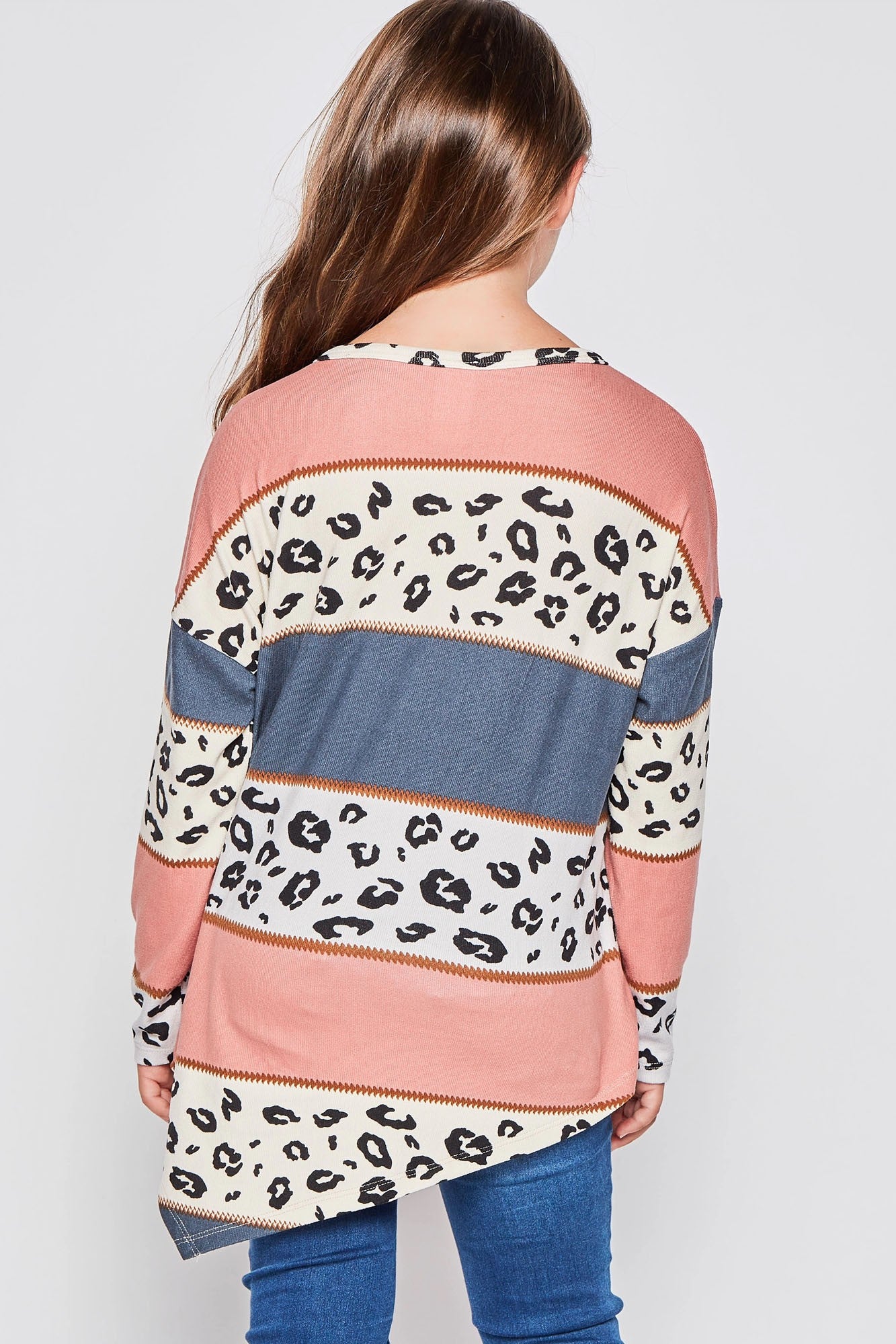 Girls long sleeve leopard print asymmetrical top by GtoG, featuring a stylish animal print design and comfortable fit.