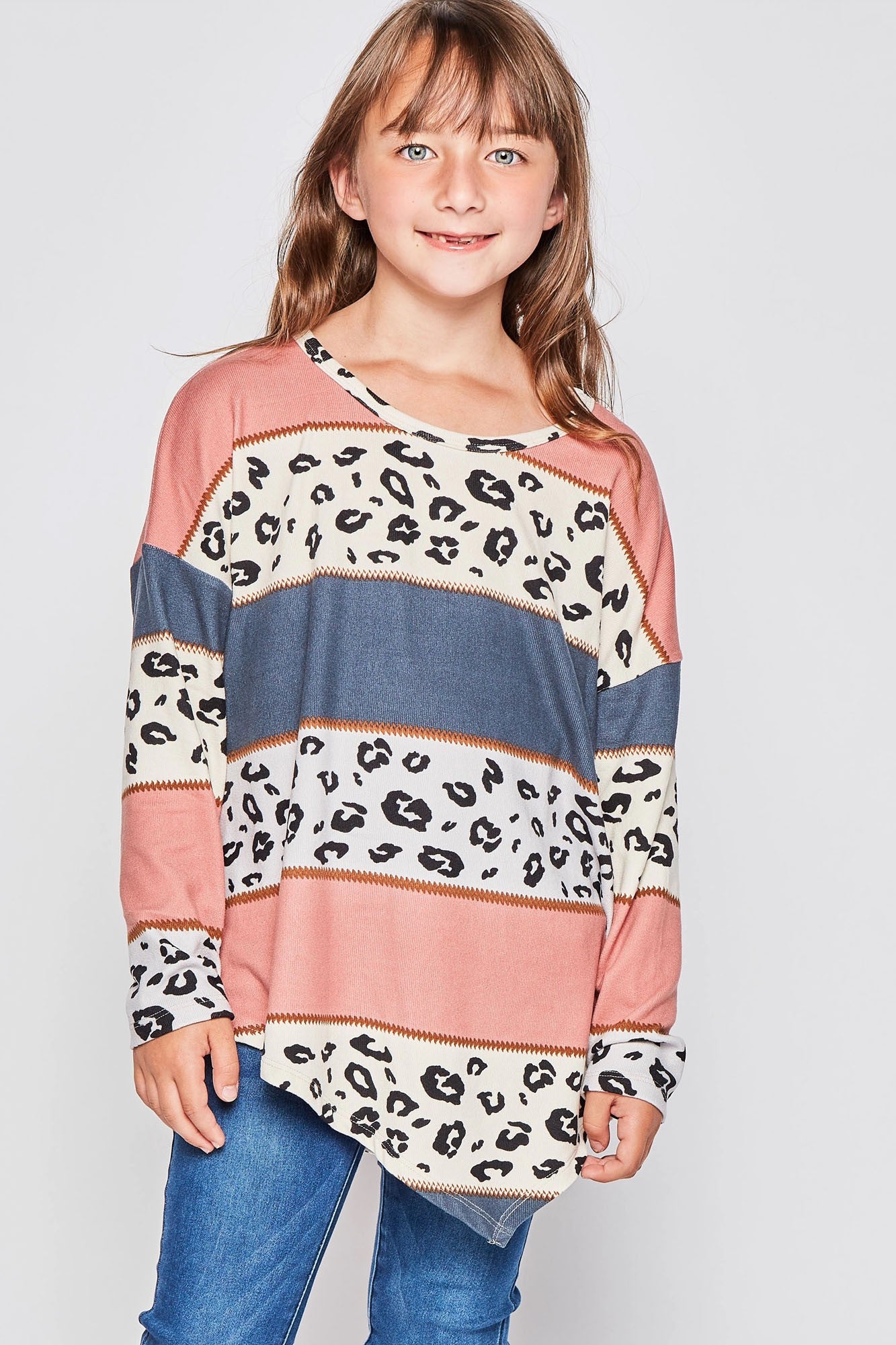 Girls long sleeve leopard print asymmetrical top by GtoG, featuring a stylish animal print design.