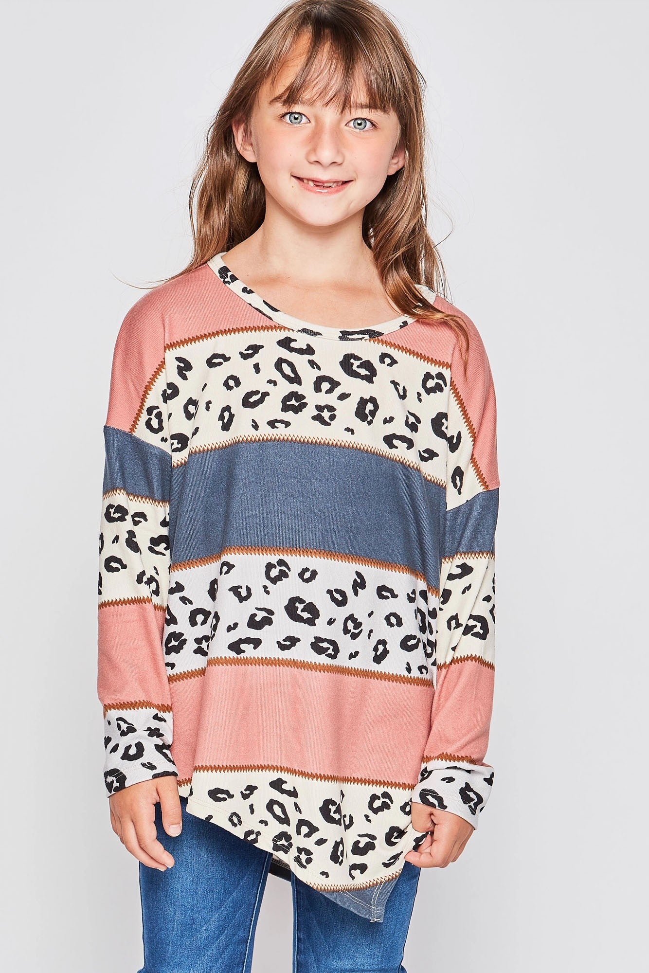 Girls long sleeve leopard print asymmetrical top by GtoG, featuring a stylish animal print design.