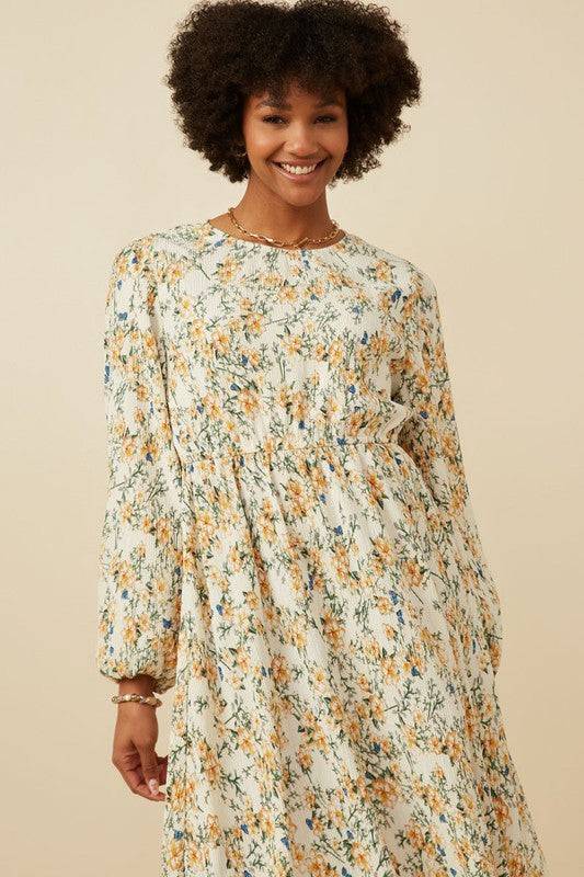 Botanical print puffed long sleeve dress by Hayden Los Angeles, featuring a flowy silhouette and vibrant floral pattern.