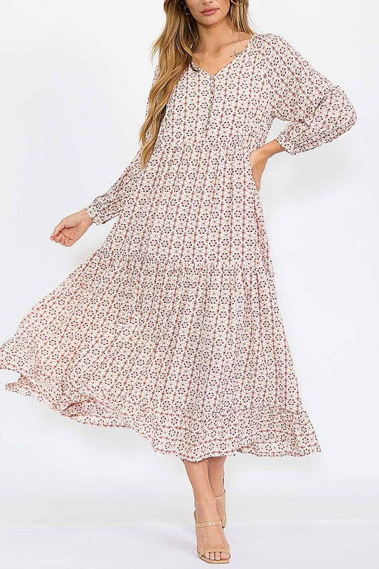 Long sleeve tiered button-front V-neck dress from Hayden Los Angeles, featuring a stylish and flowy design.