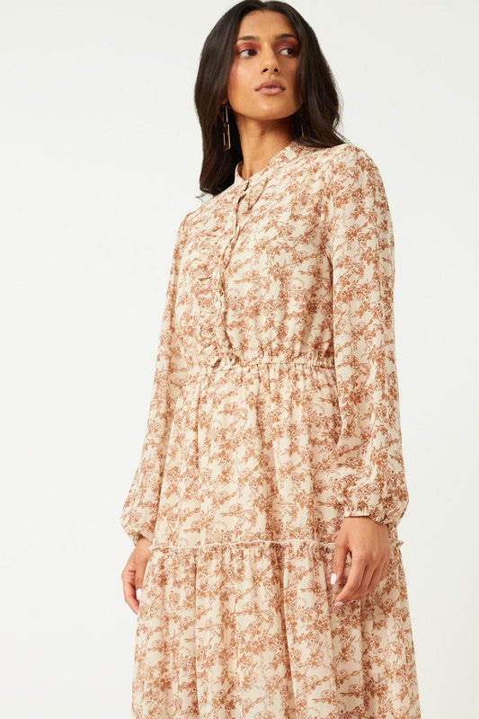 Hayden Los Angeles floral chiffon maxi dress with ruffle placket, button-up front, and flowing silhouette.