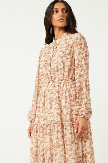 Hayden Los Angeles floral chiffon maxi dress with ruffle placket, button-up front, and flowing silhouette.