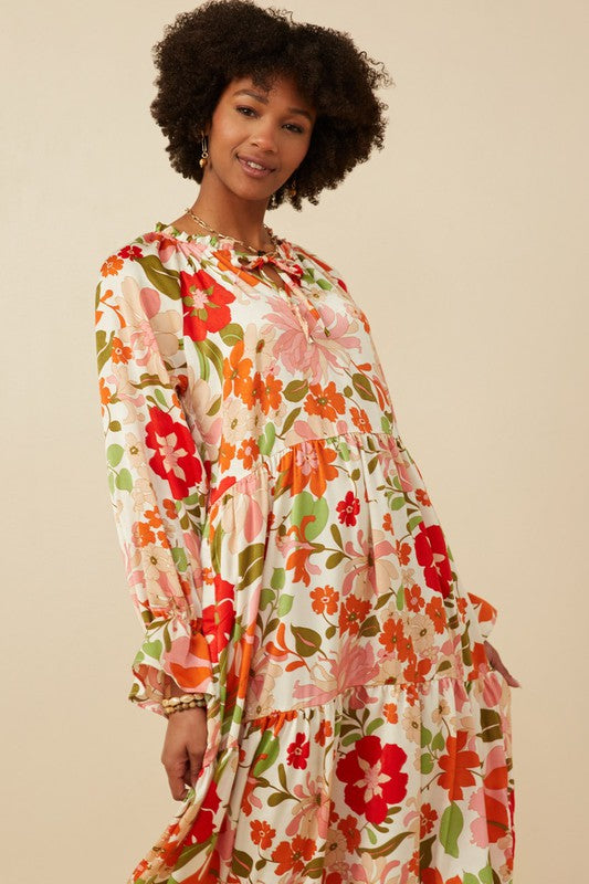 Womens satin floral tie neck tiered maxi dress by Hayden Los Angeles, featuring a flowing silhouette and elegant floral pattern.