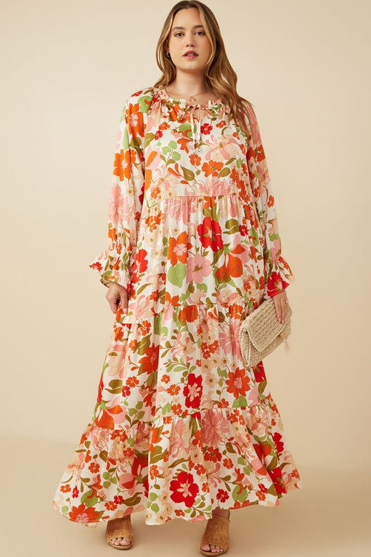 Womens satin floral tie neck tiered maxi dress by Hayden Los Angeles, featuring a flowy silhouette and elegant floral pattern.