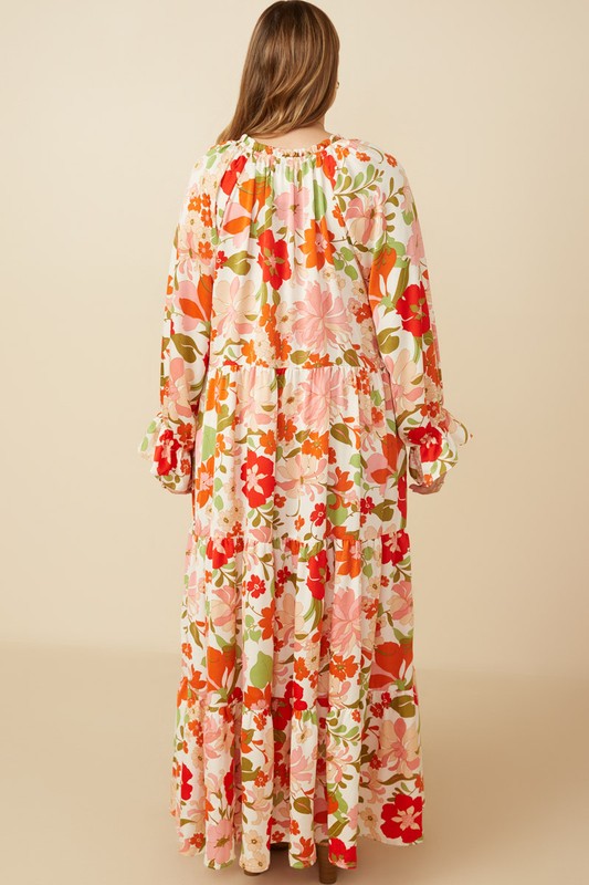 Womens satin floral tie-neck tiered maxi dress by Hayden Los Angeles, featuring a flowing silhouette and elegant floral pattern.