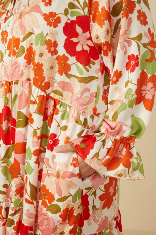 Womens satin floral tie neck tiered maxi dress by Hayden Los Angeles, featuring a flowy silhouette and elegant floral pattern.