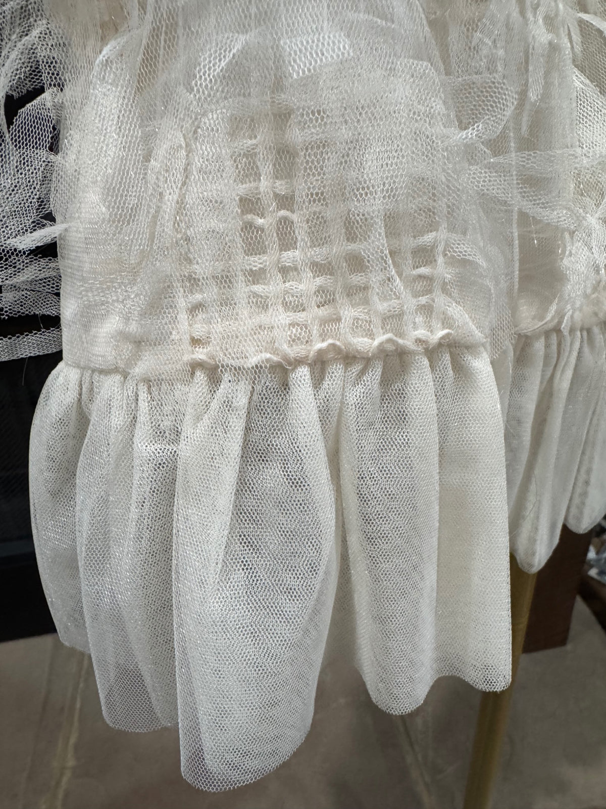 HEYSON ivory blouse tulle peplum hem detail