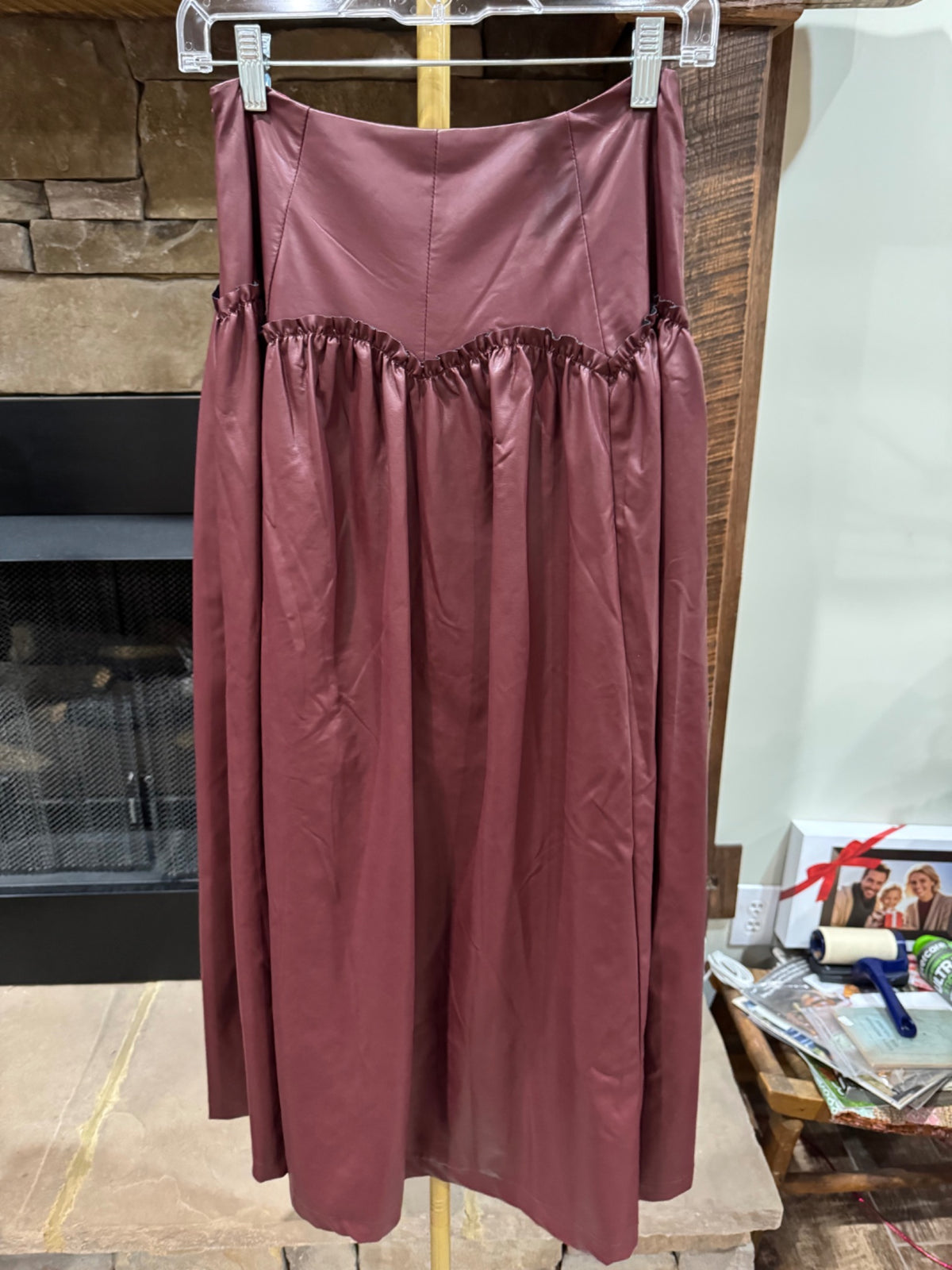 Full view of HEYSON muted wine faux leather maxi skirt
