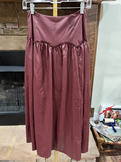 Full view of HEYSON muted wine faux leather maxi skirt