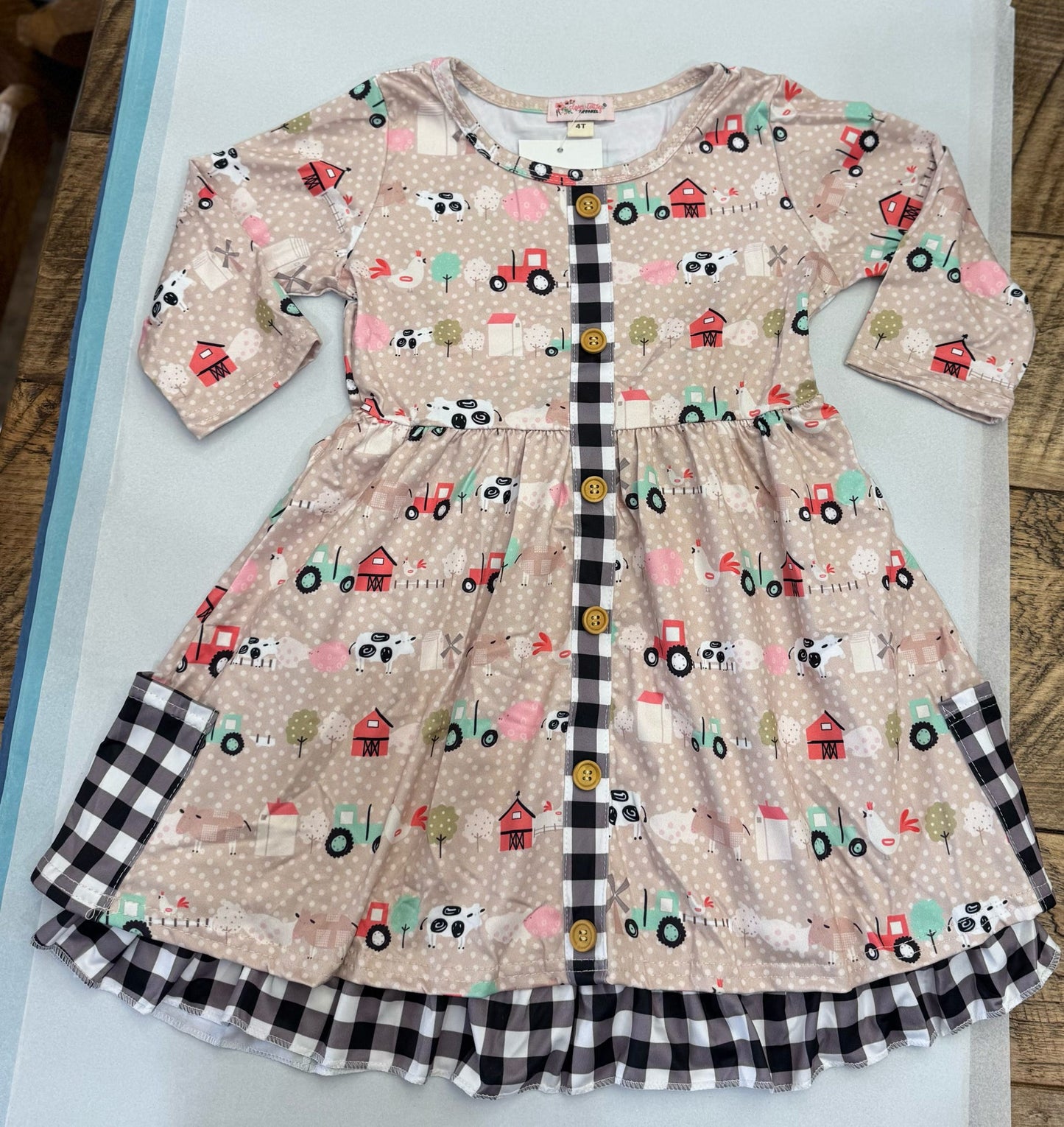 Assorted girls' summer dresses by HoneyDew featuring navy trim and blue floral patterns, suitable for 12-month-old girls.