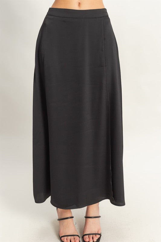 HYFVE maxi skirt with sleeveless top set in champagne color, featuring flowing fabric and stylish, comfortable design.