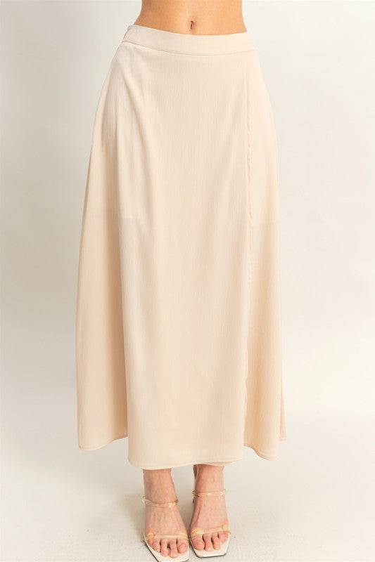 HYFVE champagne maxi skirt with sleeveless top set, flowing fabric and stylish design, perfect for casual or dressy occasions.