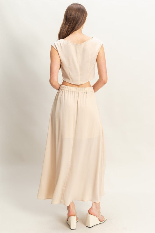 HYFVE champagne maxi skirt with matching sleeveless top set, elegant and flowing for stylish summer wear.