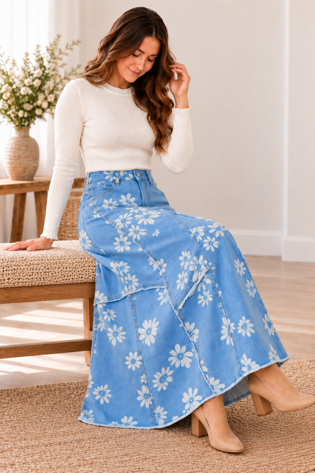Light blue daisy denim maxi skirt seated lifestyle view