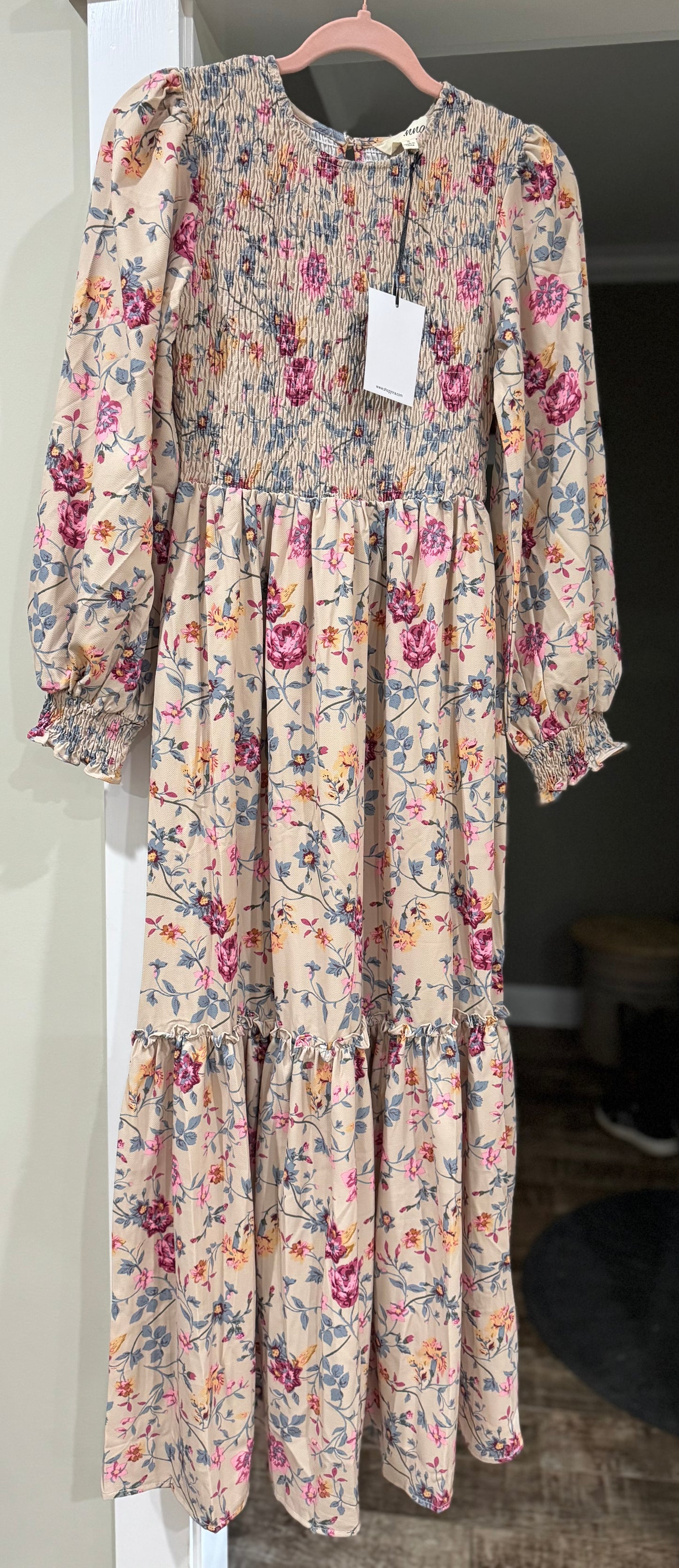 Floral print smocked tiered maxi dress by J.NNA with flowing fabric and adjustable straps, perfect for summer wear.