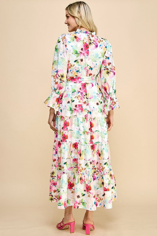 Long sleeve floral print maxi dress with ruffle accents by JJ's Fairyland, featuring a flowing design and elegant floral pattern.