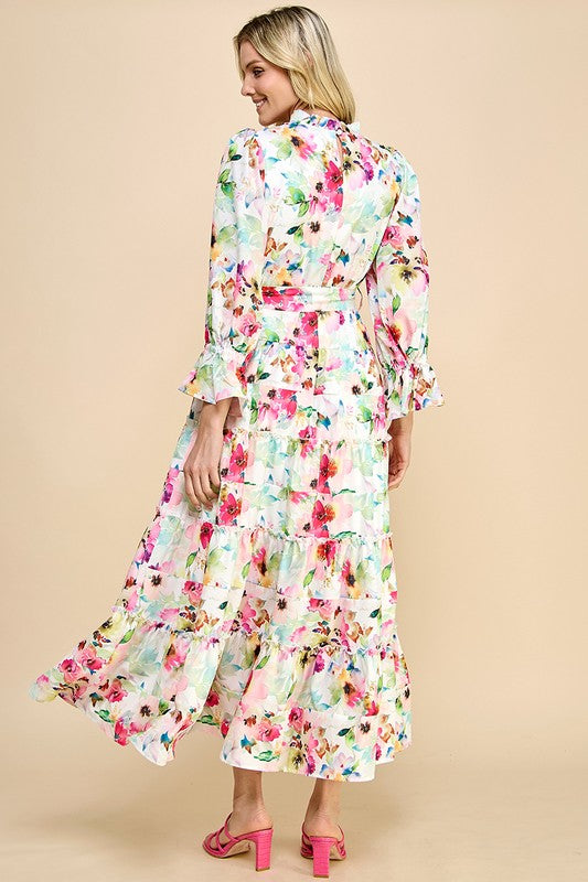 Long sleeve floral print maxi dress with ruffle accents by JJ's Fairyland, flowing fabric and elegant design.