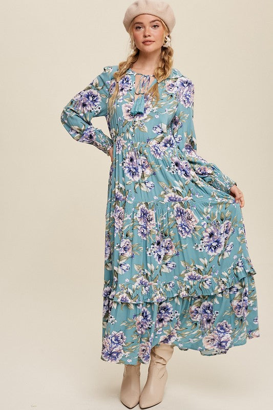 Tie front floral print maxi dress by Listicle featuring a flowy silhouette and vibrant floral pattern in a full-length design.