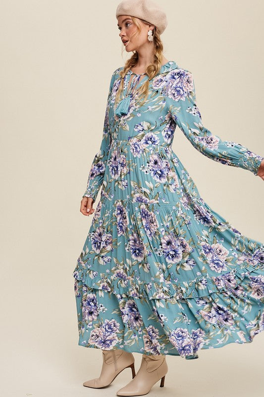 Tie front floral print maxi dress by Listicle featuring a flowy silhouette and vibrant flower pattern.