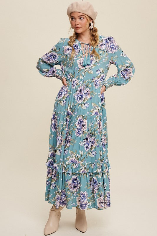 Tie front floral print maxi dress by Listicle featuring a flowing silhouette and vibrant floral patterns.