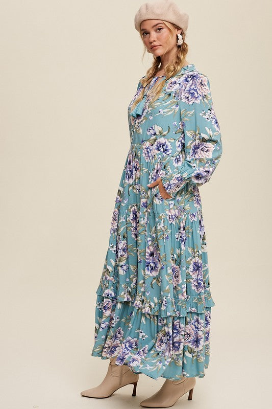 Floral print maxi dress with tie-front detail by Listicle, featuring a flowing silhouette and vibrant flower patterns.