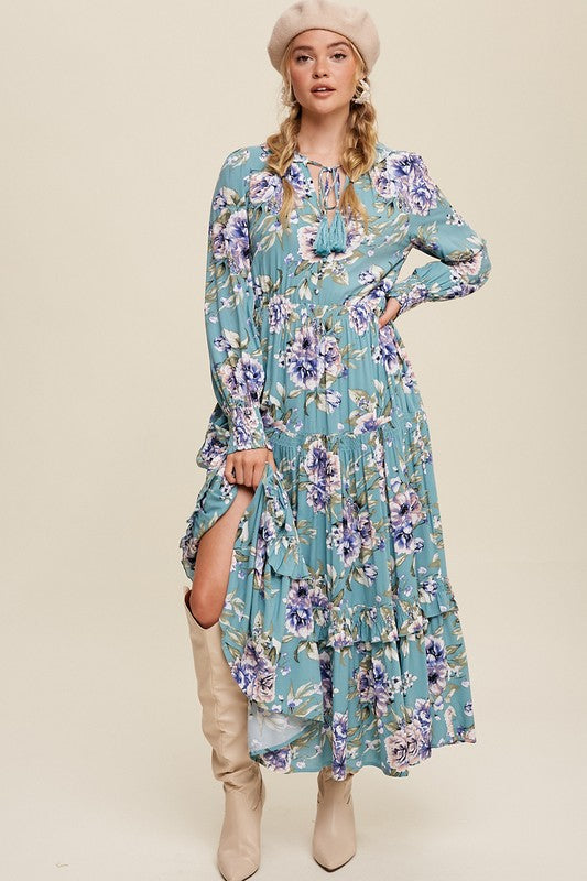 Listicle floral print maxi dress with a tie front, flowing fabric, and vibrant floral design, perfect for summer or casual occasions.
