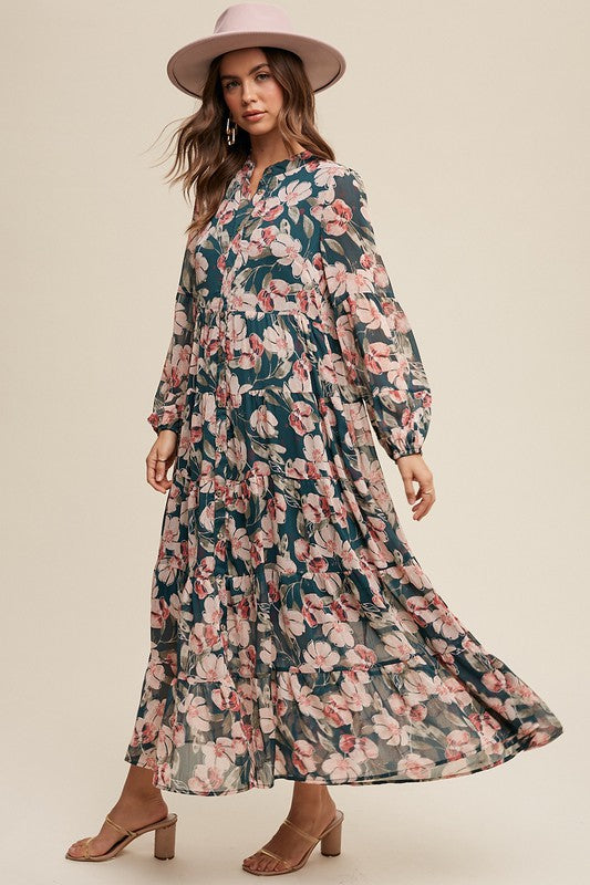 Floral flowy long sleeve button-down maxi dress by Listicle featuring a relaxed fit and vibrant floral pattern.