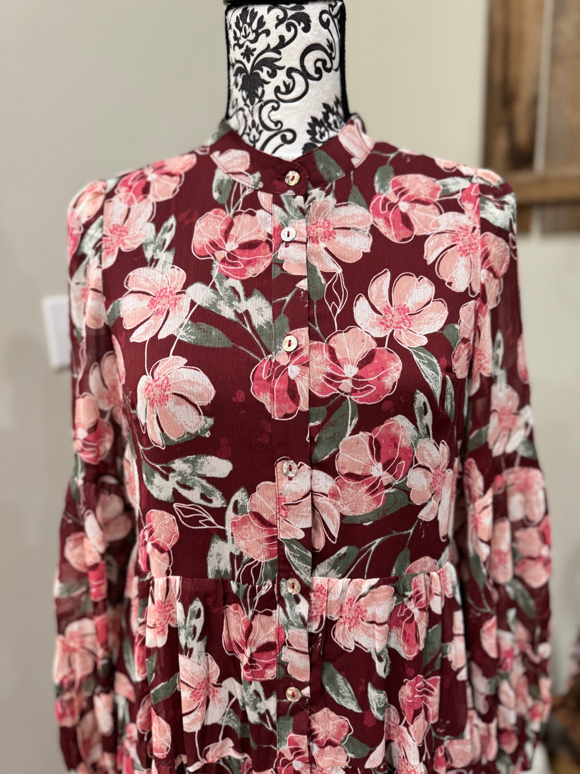 Floral flowy long sleeve button-down maxi dress by Listicle featuring a vibrant floral pattern and a relaxed, elegant fit.