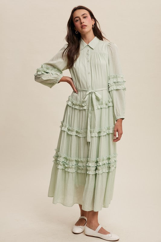 Luxurious mint frill maxi dress by Listicle, flowing fabric with ruffle details, sleeveless design perfect for elegant occasions.