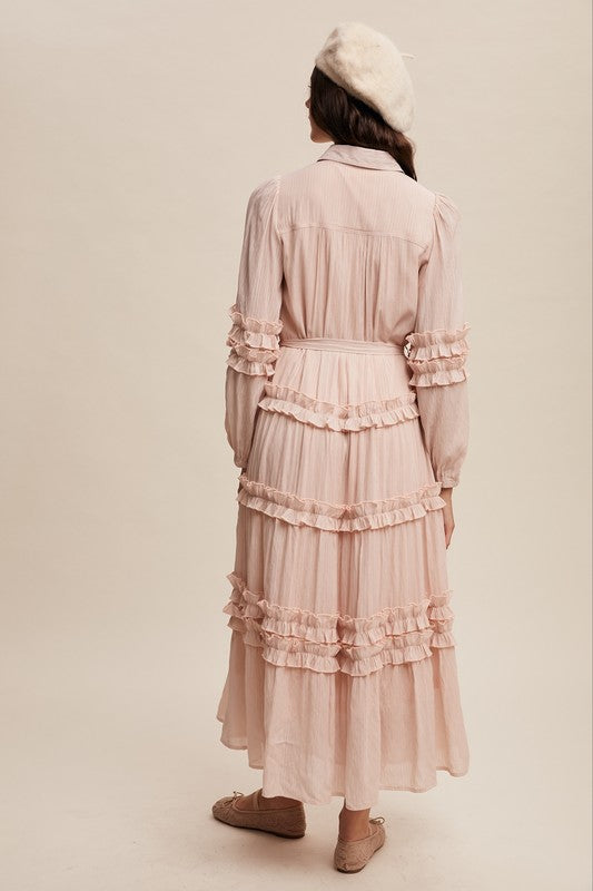 Luxurious pink blush frill maxi dress by Listicle, flowing fabric with ruffle details perfect for elegant occasions.