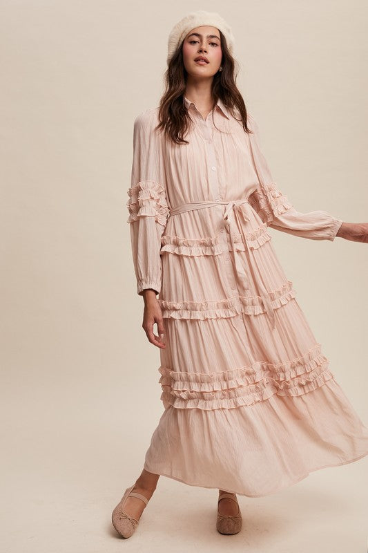 Luxurious pink blush frill maxi dress by Listicle, flowing fabric with ruffle details, perfect for elegant occasions.