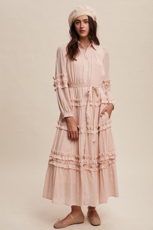 Luxurious pink blush frill maxi dress by Listicle, flowing fabric with ruffled details, perfect for elegant occasions.
