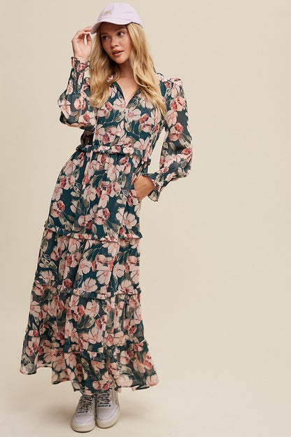 Hunter green floral maxi dress from Listicle featuring V-neck, ruffled tiers, and a flowing silhouette.