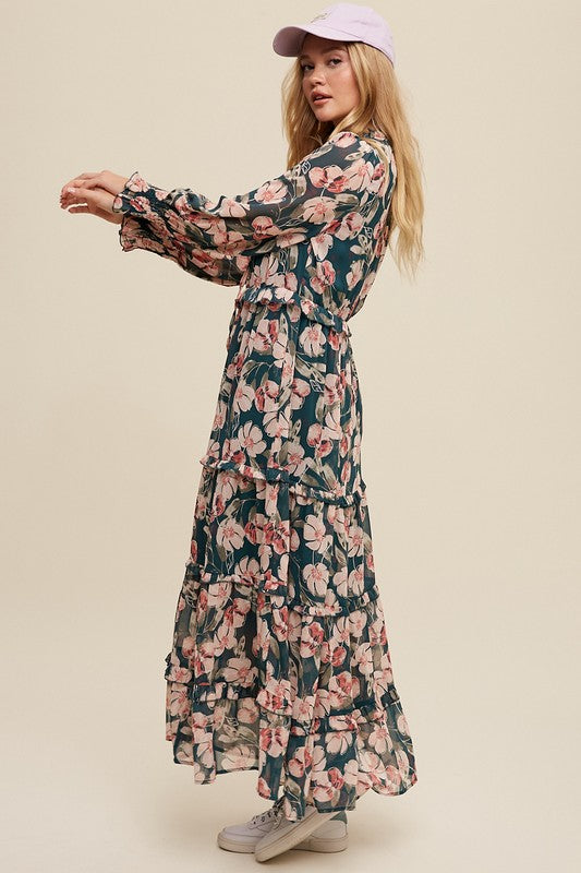 Hunter green floral maxi dress by Listicle featuring a V-neckline, ruffled tiers, and a flowing, elegant design.